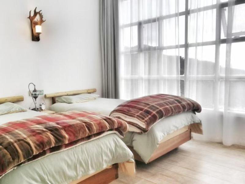 יוניאנג Jacky'S Guesthouse מראה חיצוני תמונה